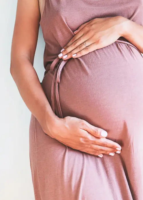 Newborn care specialist with baby