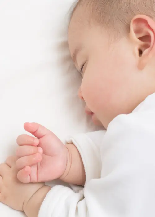 Newborn care specialist with baby